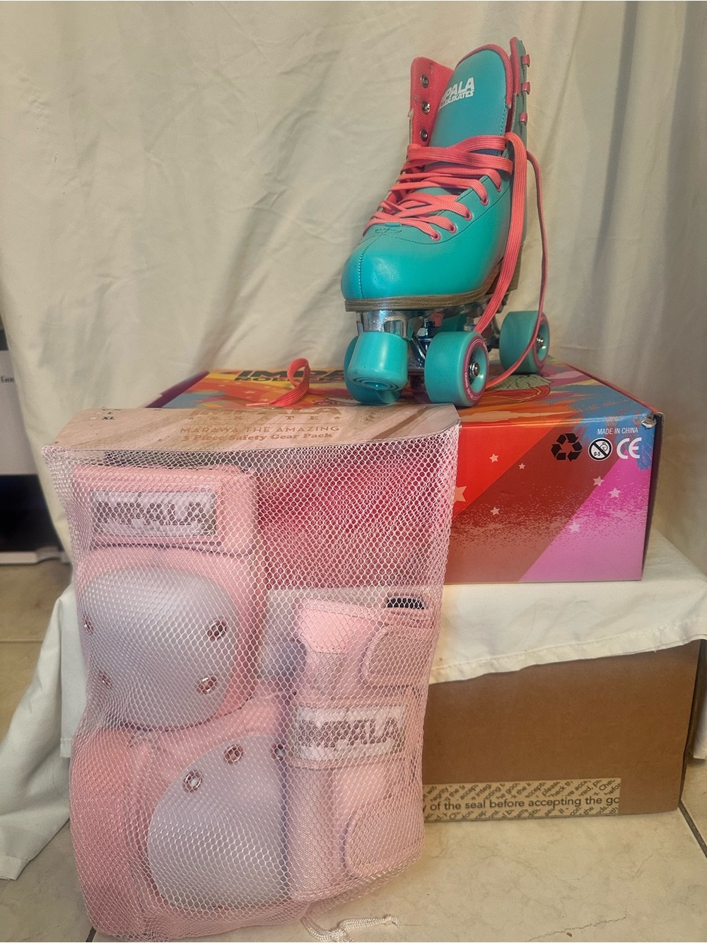 Newish Teal and Pink Retro Roller Skates - Impala Wheel Detail